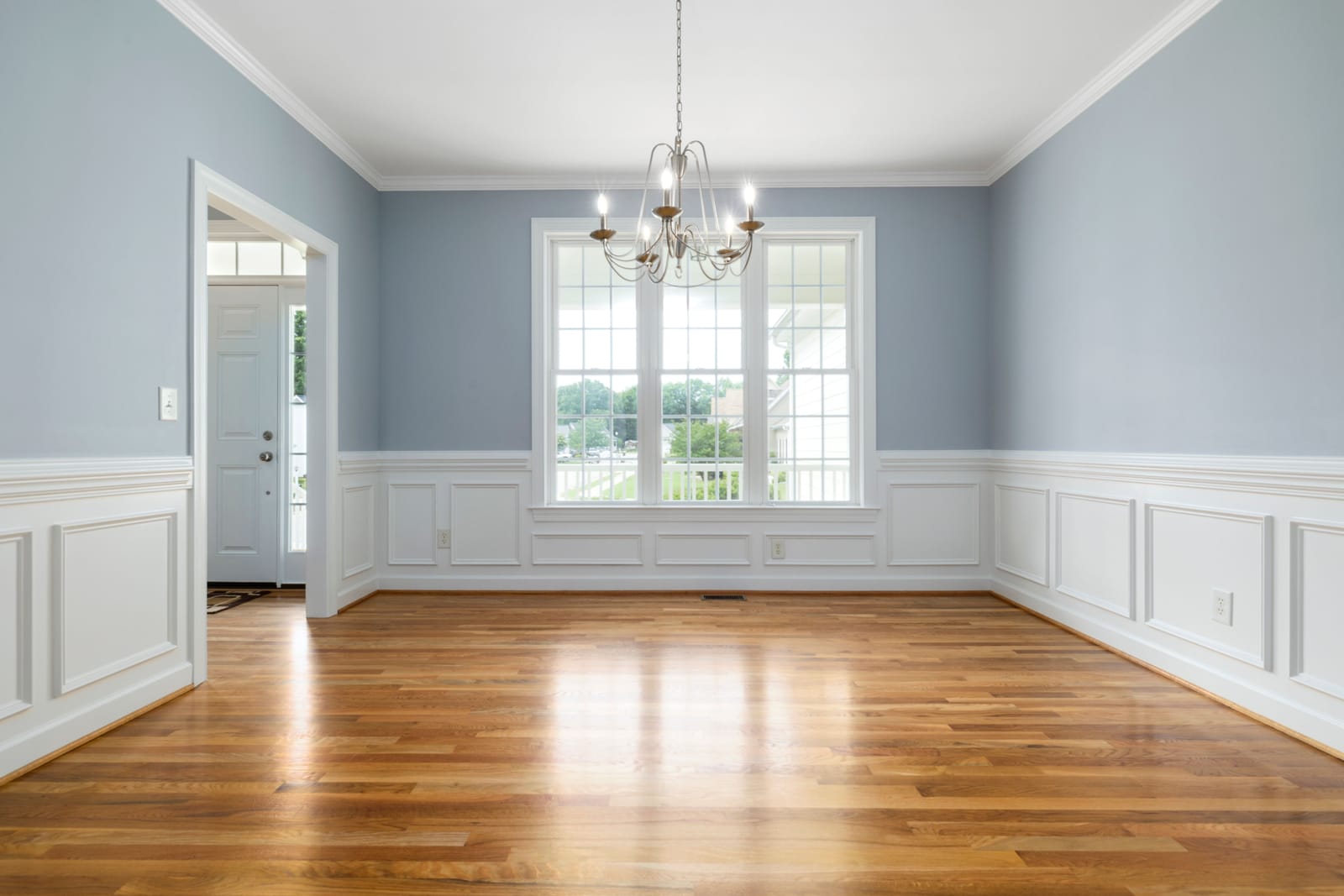 Completed wood flooring project in a bright Las Vegas dining room