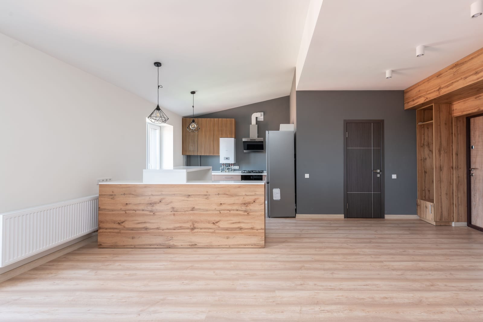 Light oak wood flooring in an open Las Vegas kitchen and living space
