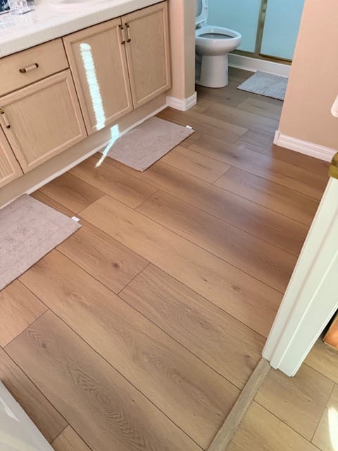 Luxury vinyl plank flooring installed in a Las Vegas bathroom
