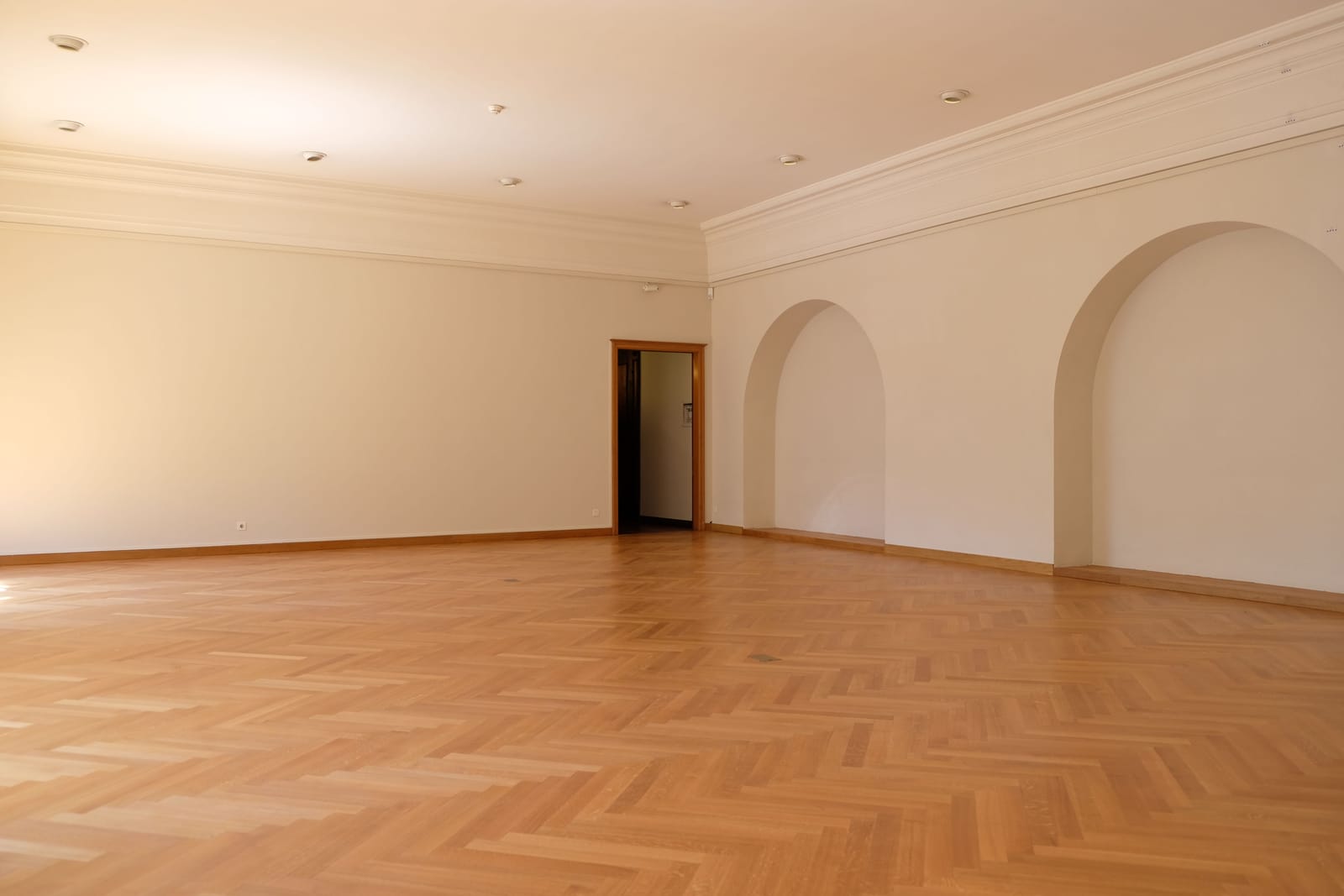 Parquet wood flooring in a bright, spacious Las Vegas room